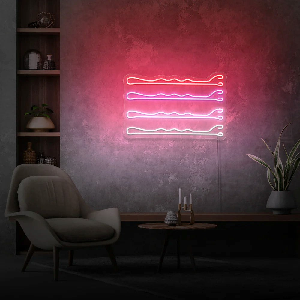 neon do salonu fryzjerskiego symbolizujący spinki do włosó