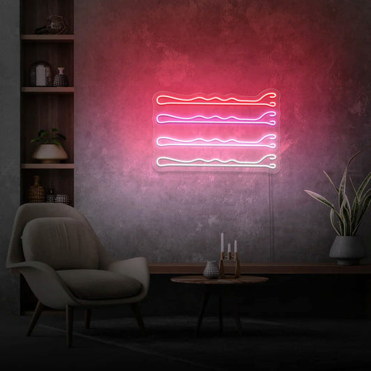 neon do salonu fryzjerskiego symbolizujący spinki do włosó