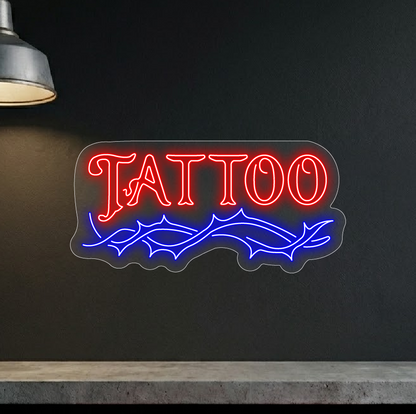 Neon "tattoo" na tle ciemnej ściany w lokalu